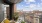 Balcony with seating overlooking buildings